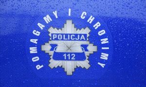 zdjęcie z napisem policja, pomagamy i chronimy oraz numer alarmowy 112