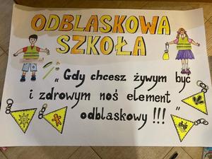 na zdjęciu rysunek odblaskowa szkoła