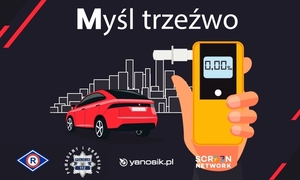 na zdjęciu napis myśl trzeźwo auto oraz alkomat