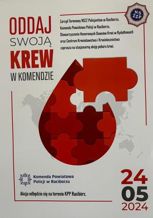 na zdjęciu plakat oddaj krew w komendzie