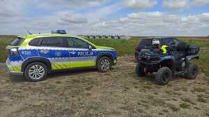 na zdjęciu radiowóz i quad